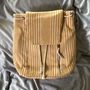 Soft cotton backpack with lots of pockets and zippers made by Universal thread